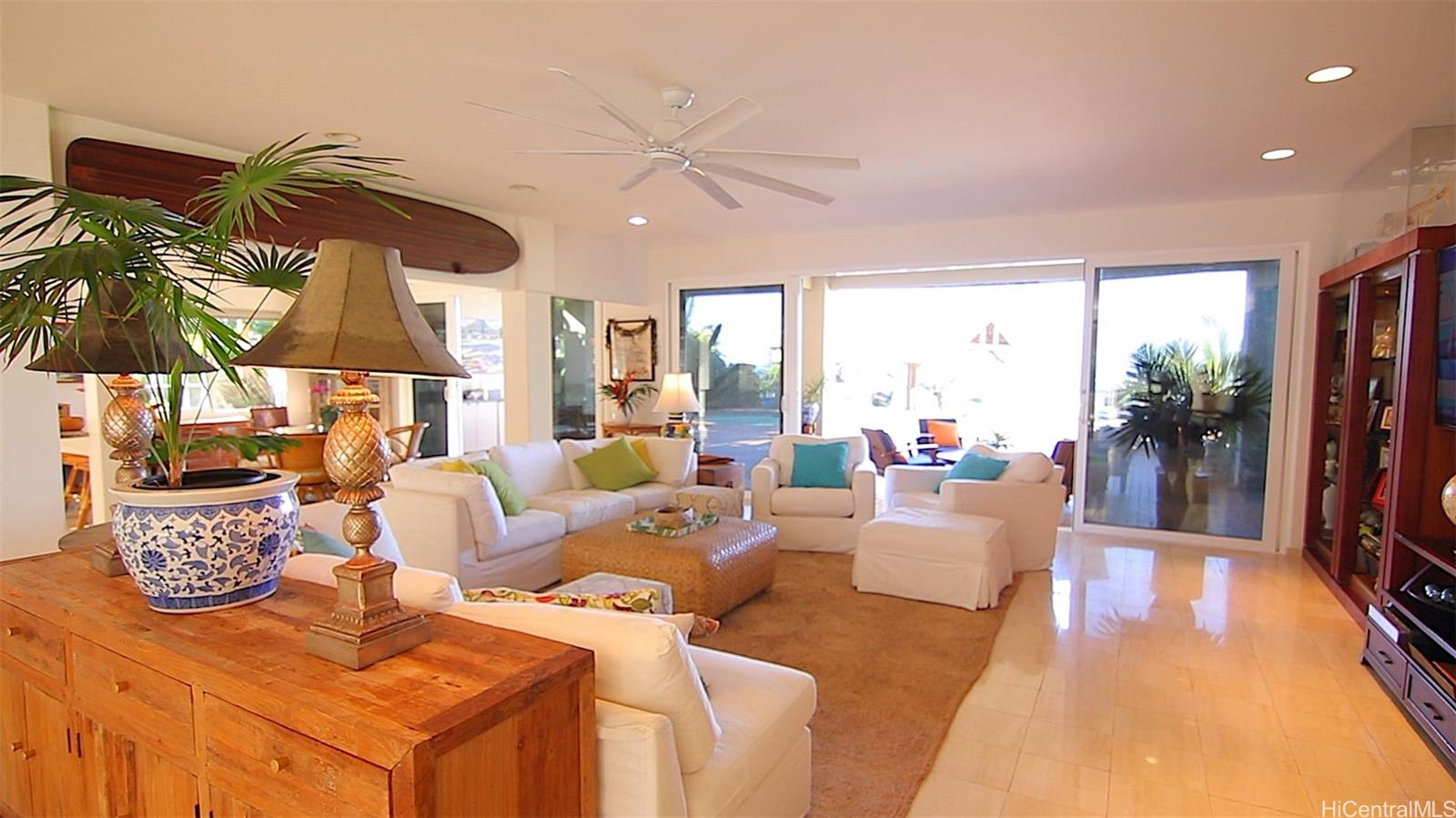 469 Portlock Road, Unit A Honolulu, HI 96825 - Photo 9 of 25 a living room with furniture and a large window