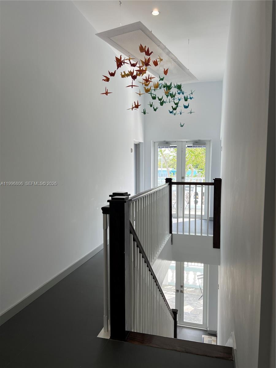 1818 Southwest 22nd Avenue, Unit 1 Miami, FL 33145 - Photo 13 of 18 a view of entryway with a front door and wooden floor