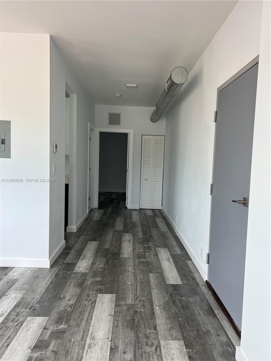 1818 Southwest 22nd Avenue, Unit 1 Miami, FL 33145 - Photo 3 of 18 a view of a hallway