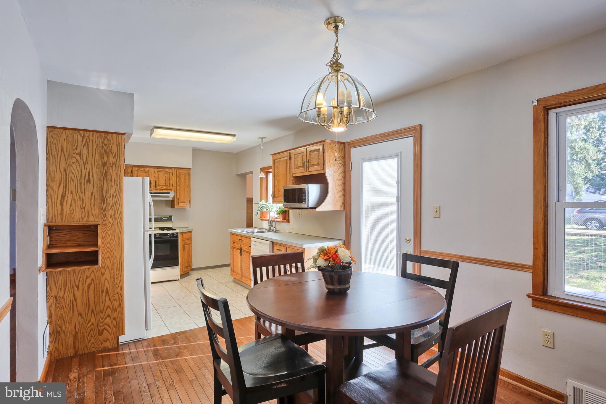 8161 Chambers Hill Road Harrisburg, PA 17111 - Photo 7 of 46 Spacious Dining Area opens to rear deck