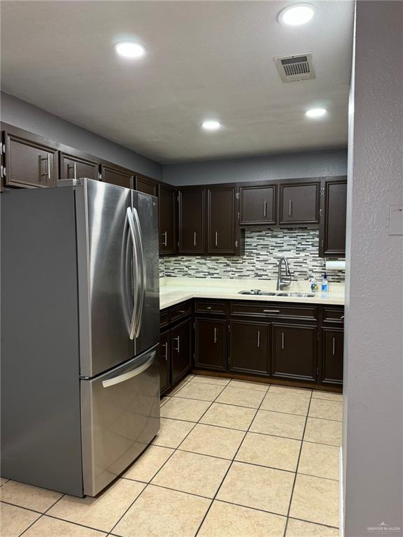 2004 Mynah Avenue McAllen, TX 78504 - Photo 4 of 10 a kitchen with stainless steel appliances granite countertop a refrigerator and a sink