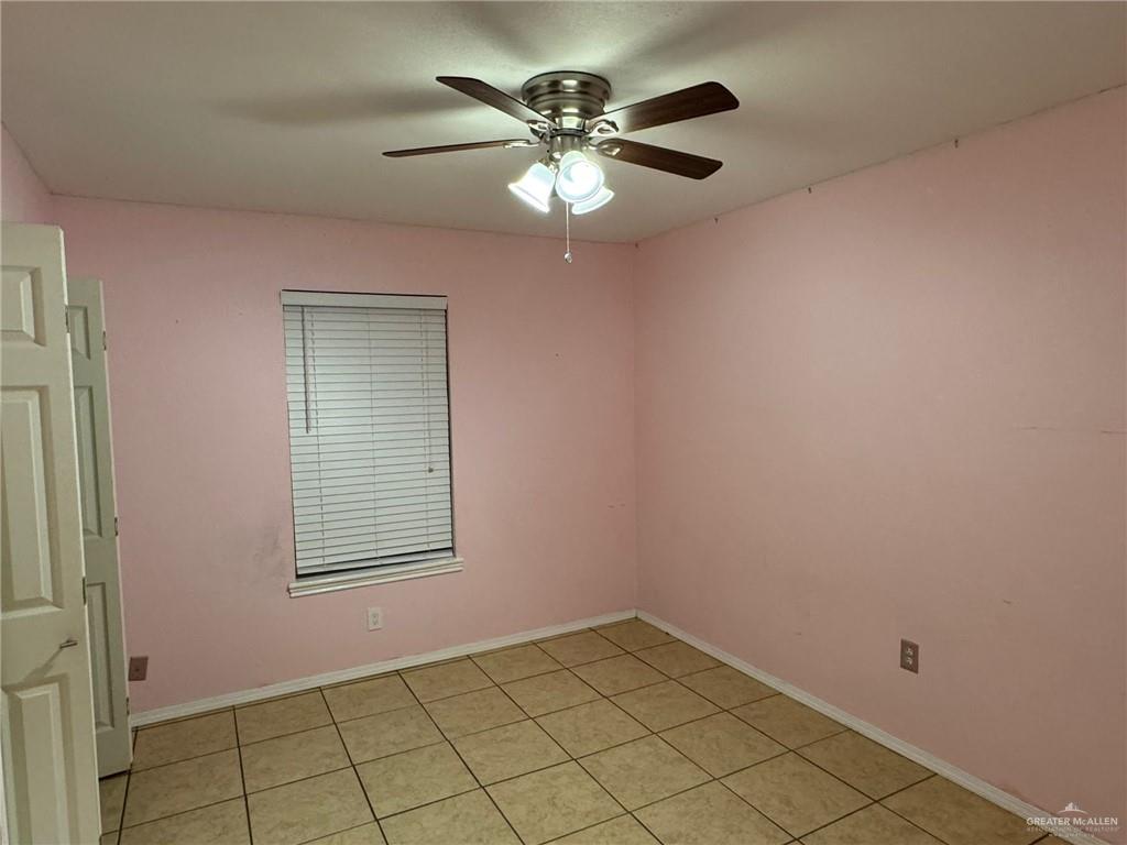 2004 Mynah Avenue McAllen, TX 78504 - Photo 6 of 10 a view of an empty room with a window