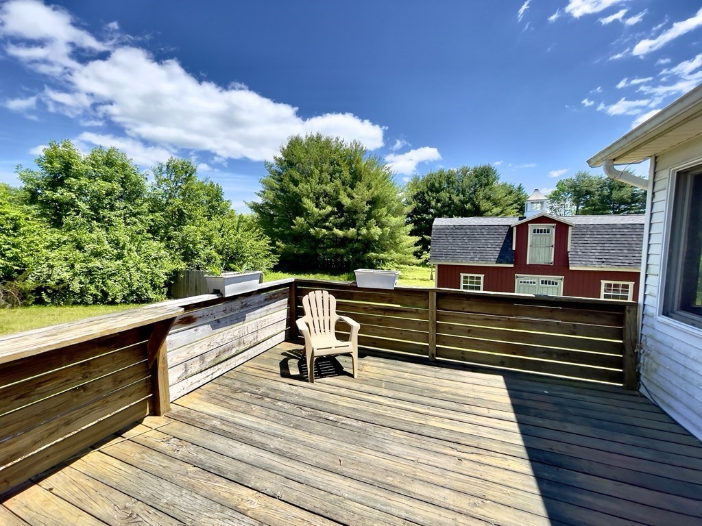 192 Hadley Road Sunderland, MA 01375 - Photo 12 of 30 a balcony view with a seating space