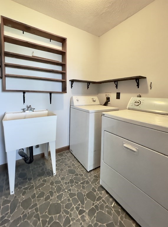 192 Hadley Road Sunderland, MA 01375 - Photo 19 of 30 a room with a sink and a washer dryer