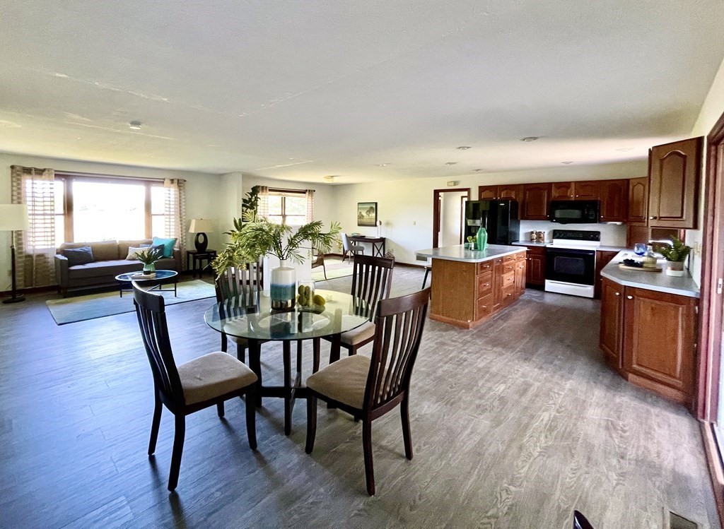 192 Hadley Road Sunderland, MA 01375 - Photo 4 of 30 a view of a dining room with furniture window and wooden floor