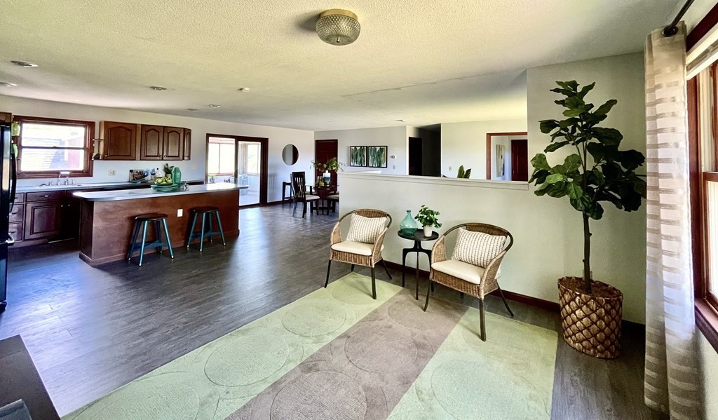 192 Hadley Road Sunderland, MA 01375 - Photo 5 of 30 a living room with furniture and a wooden floor