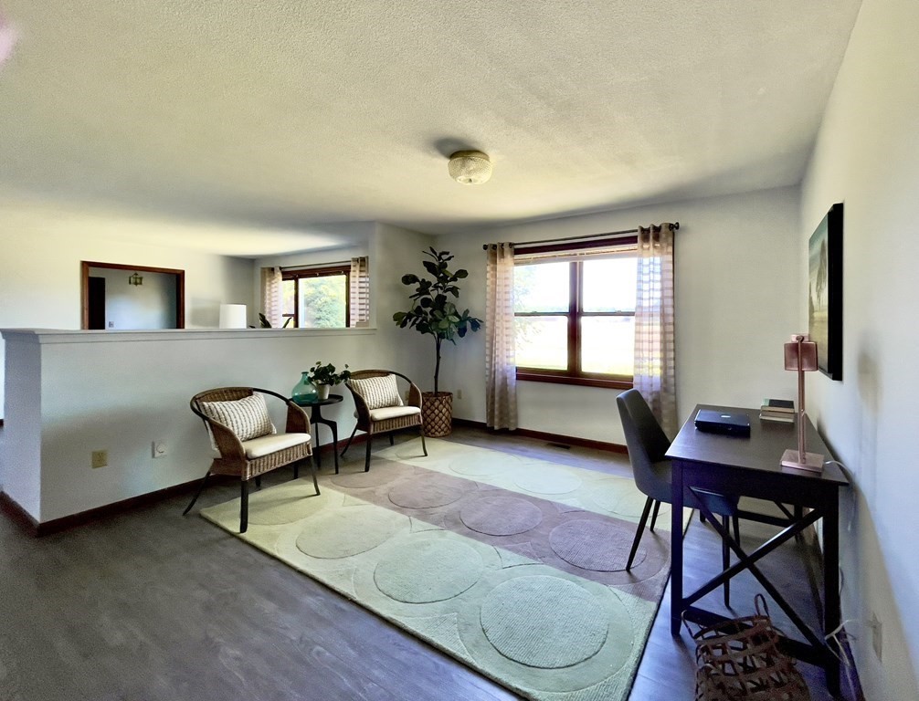 192 Hadley Road Sunderland, MA 01375 - Photo 6 of 30 a livingroom with furniture and a window