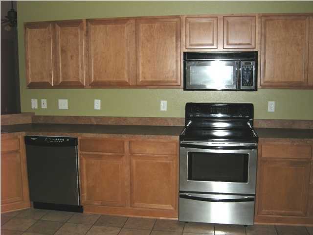 112 Bayou Landing Road Miramar Beach, FL 32550 - Photo 6 of 13 a stove top oven sitting inside of a kitchen