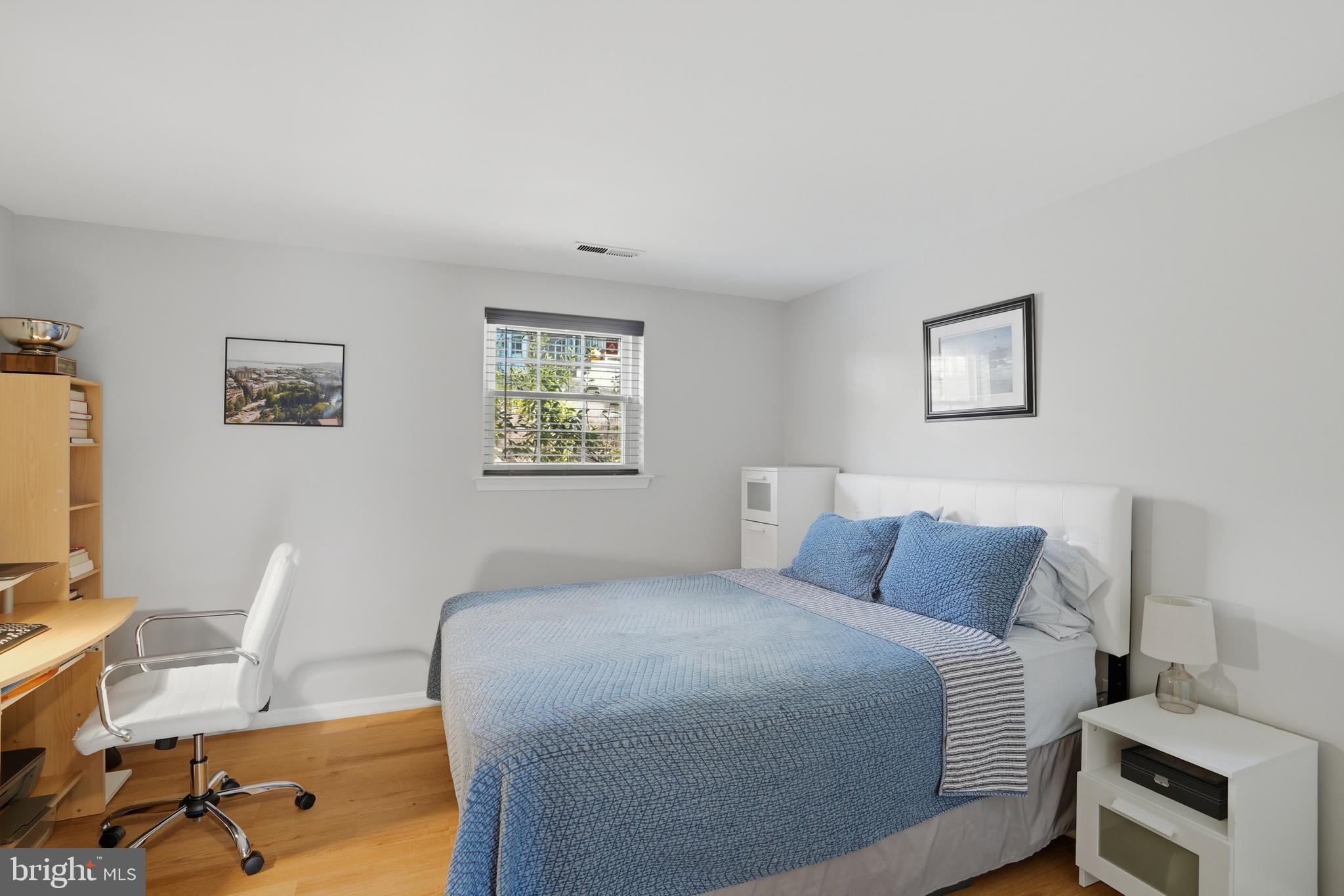 6172 Forest Creek Court Springfield, VA 22152 - Photo 36 of 42 a bedroom with a bed and a desk