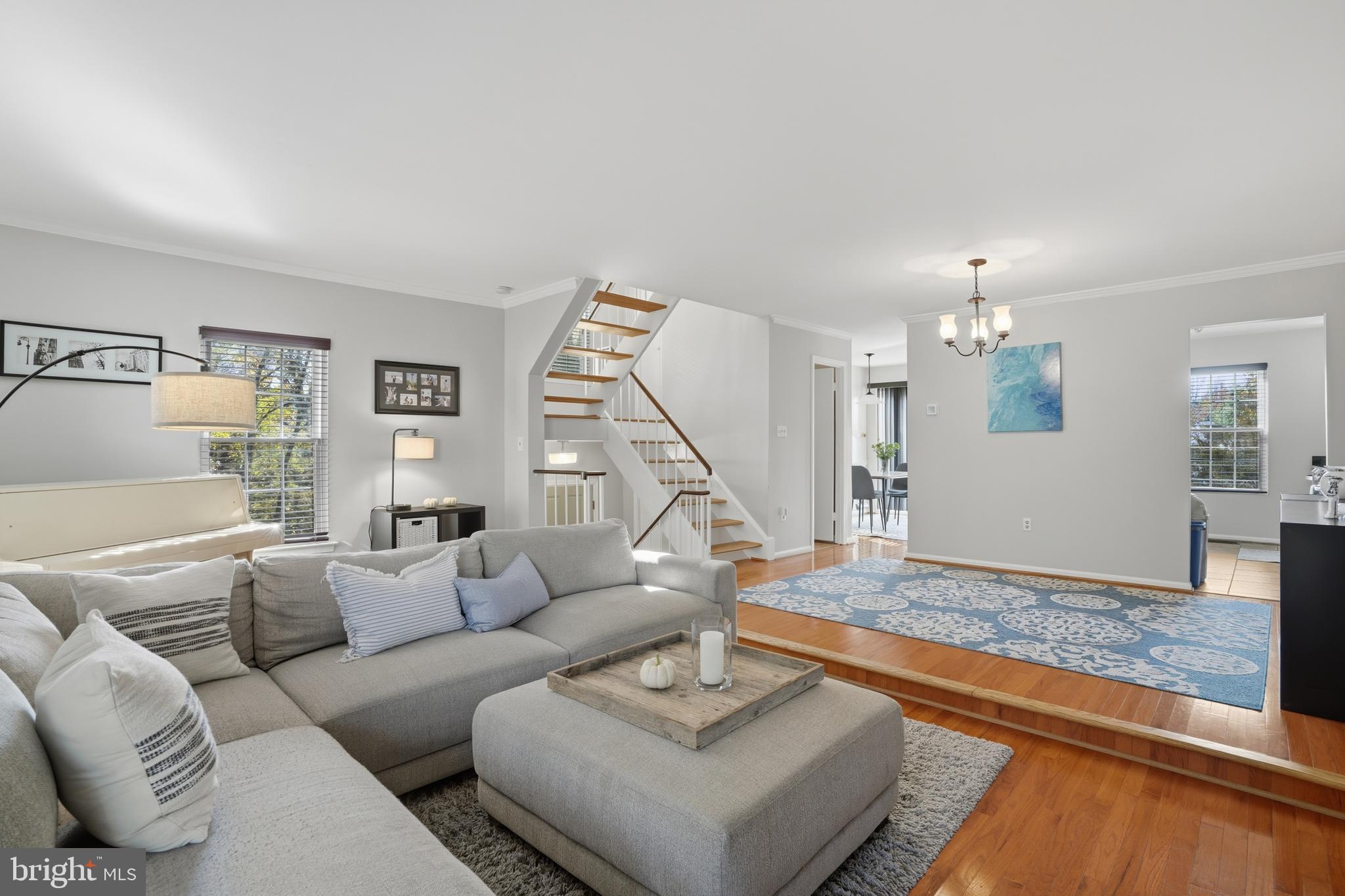 6172 Forest Creek Court Springfield, VA 22152 - Photo 10 of 42 a living room with furniture and wooden floor