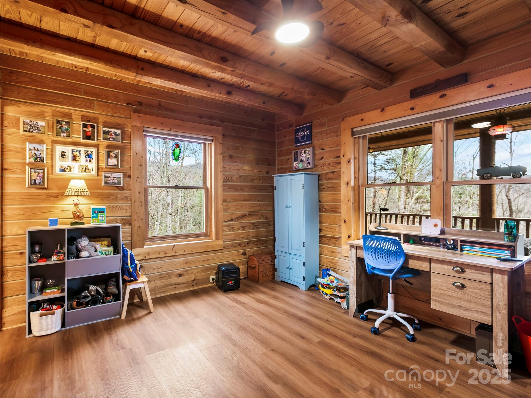 1239 Lower Loop Drive Fletcher, NC 28732 - Photo 12 of 24 a view of a livingroom with workspace and a window