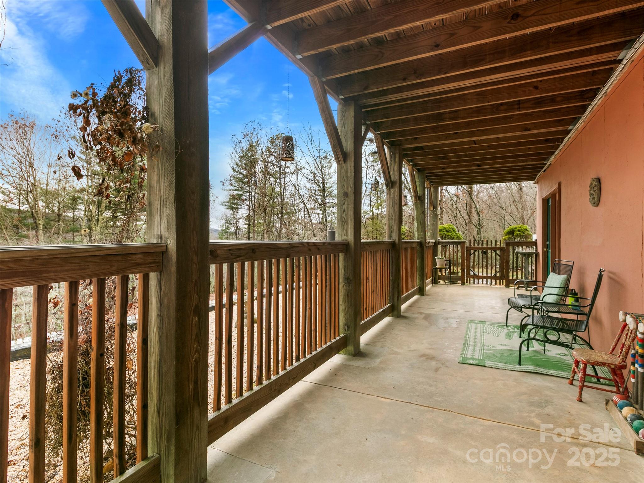 1239 Lower Loop Drive Fletcher, NC 28732 - Photo 20 of 24 a view of two chairs in the balcony