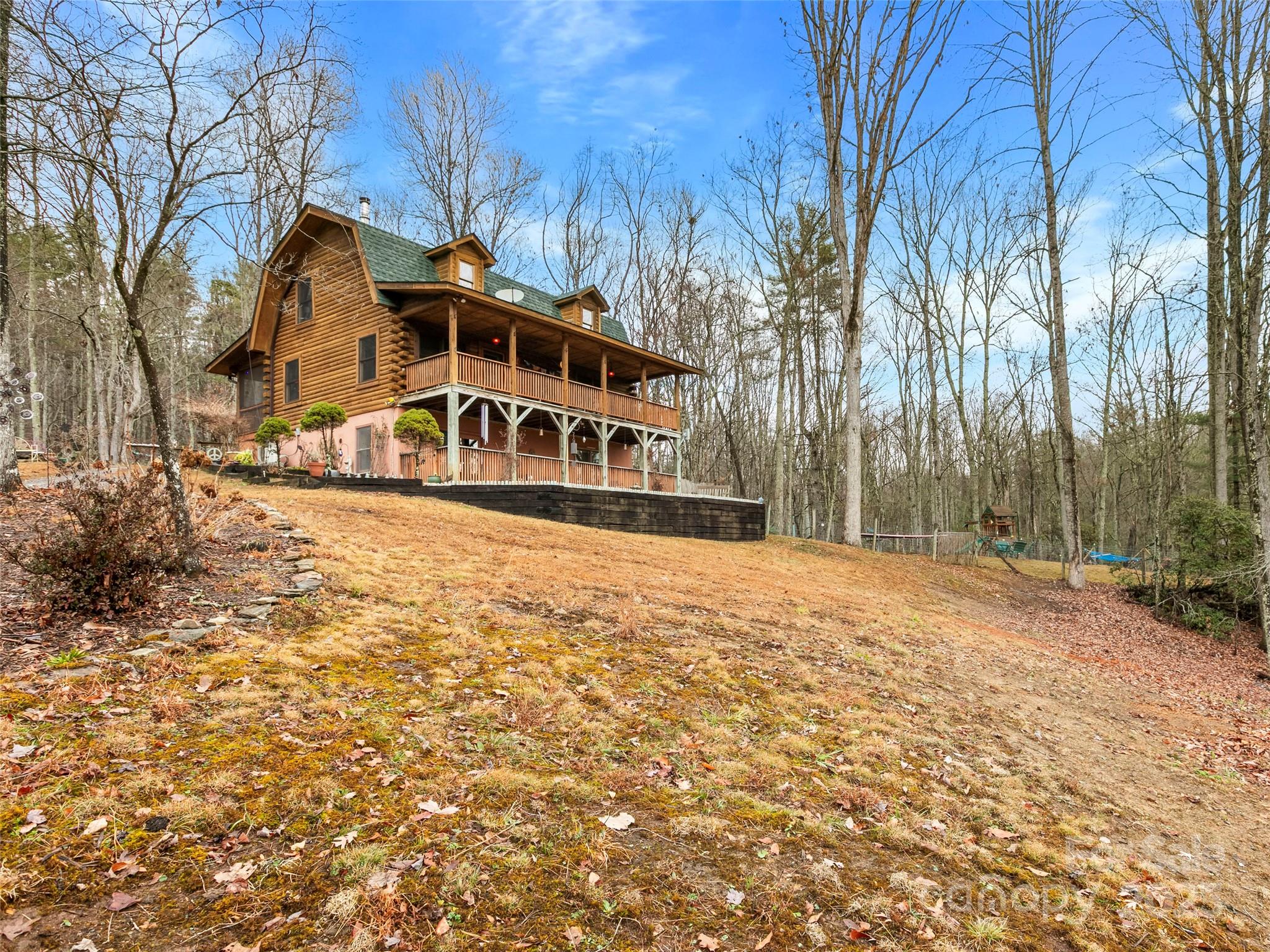 1239 Lower Loop Drive Fletcher, NC 28732 - Photo 2 of 24 a front view of a house with a yard