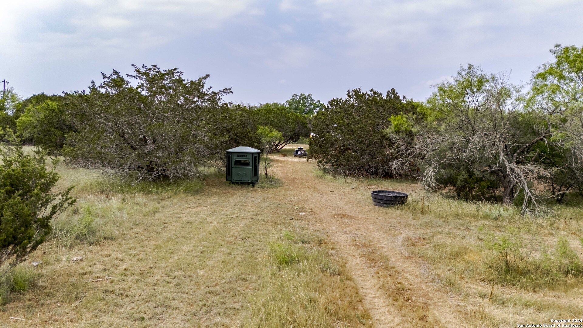 106 Homilius Road Comfort, TX 78013 - Photo 29 of 45 a backyard of a house with lots of green space