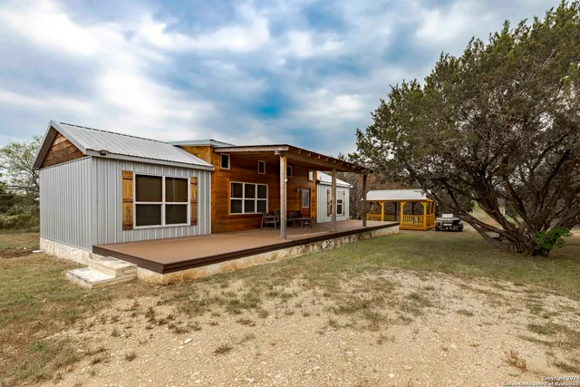 a house view with a outdoor space