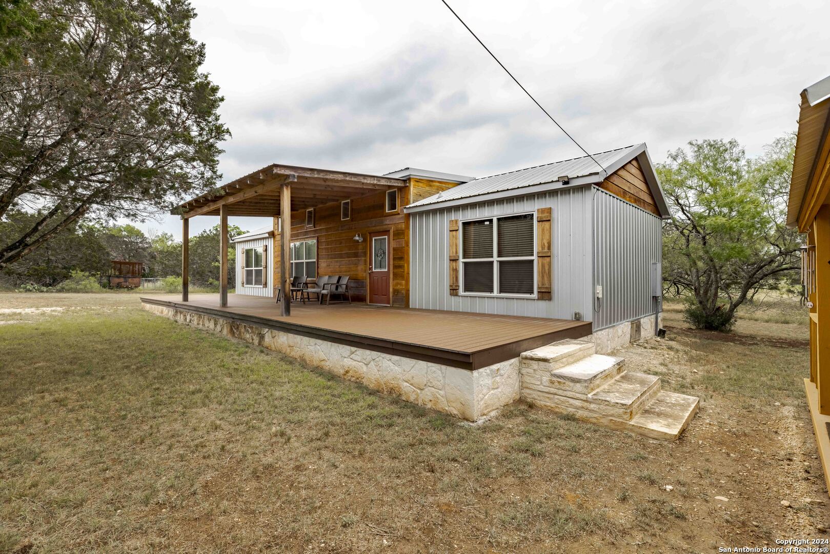 106 Homilius Road Comfort, TX 78013 - Photo 6 of 45 a house view with a outdoor space