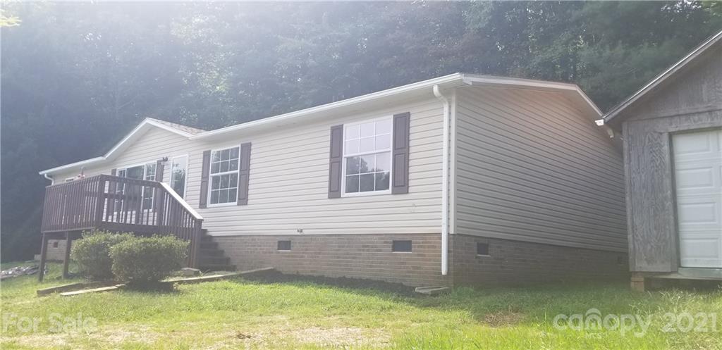 4880 Crystal Creek Road Morganton, NC 28655 - Photo 1 of 26 a backyard of a house