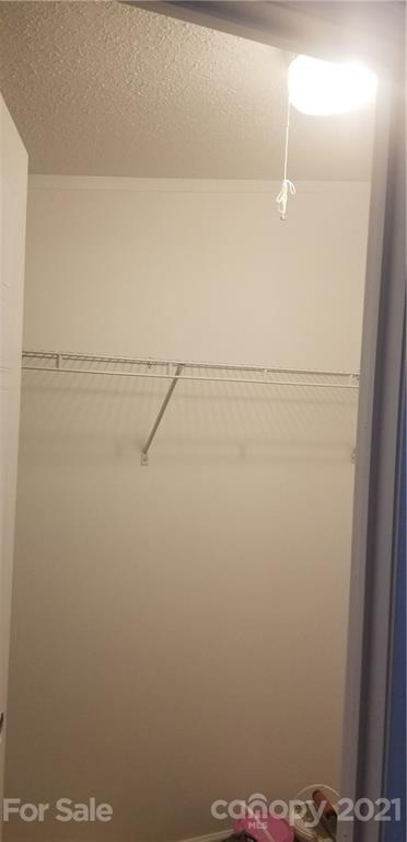 4880 Crystal Creek Road Morganton, NC 28655 - Photo 13 of 26 a view of small space with racks on the wall