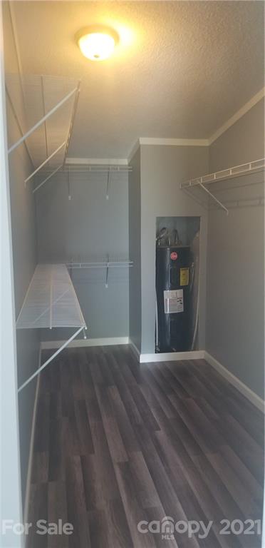 4880 Crystal Creek Road Morganton, NC 28655 - Photo 20 of 26 a view of a hallway with wooden floor