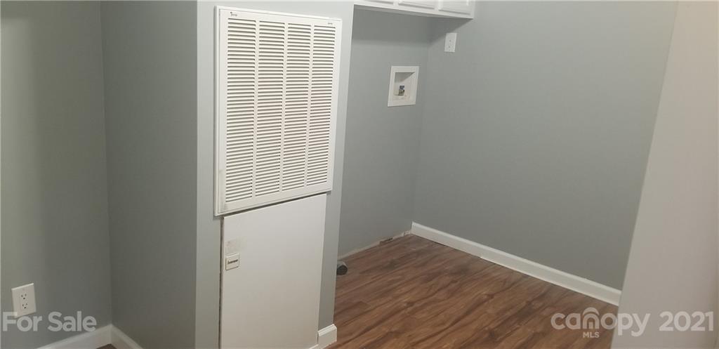 4880 Crystal Creek Road Morganton, NC 28655 - Photo 21 of 26 a view of a small space with wooden floor and a window