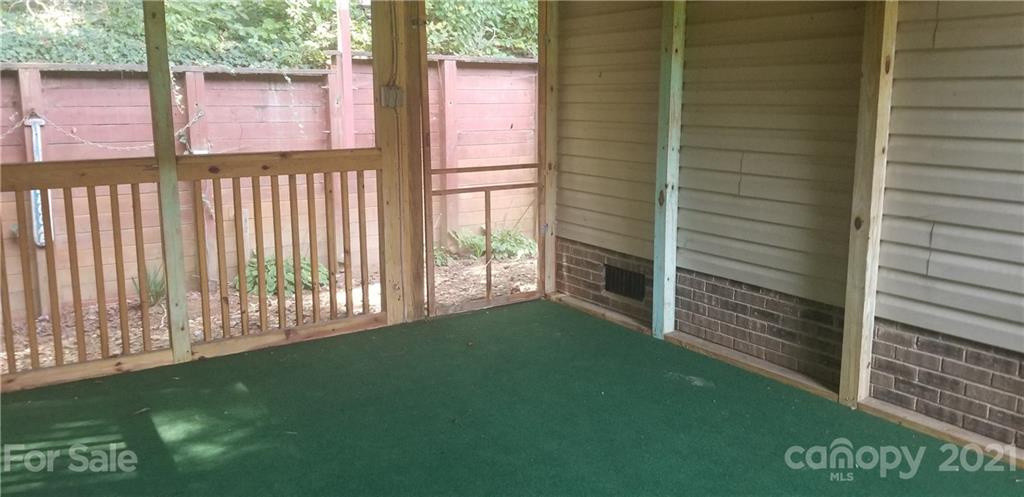4880 Crystal Creek Road Morganton, NC 28655 - Photo 25 of 26 a view of a porch with a yard