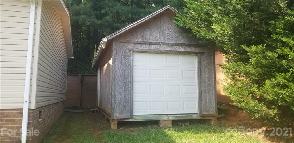 4880 Crystal Creek Road Morganton, NC 28655 - Photo 26 of 26 a house view with a outdoor space