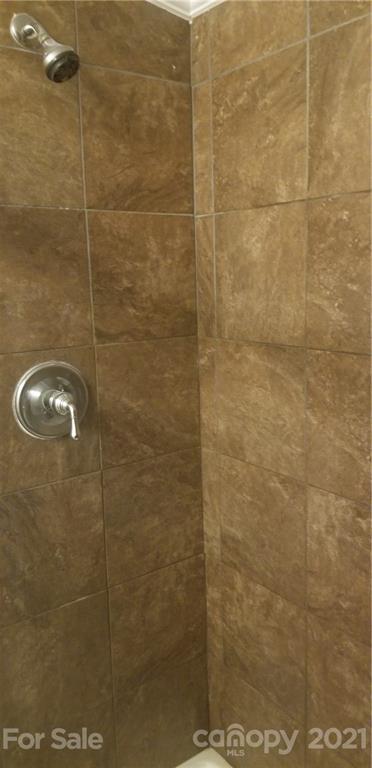 4880 Crystal Creek Road Morganton, NC 28655 - Photo 10 of 26 a bathroom with a shower