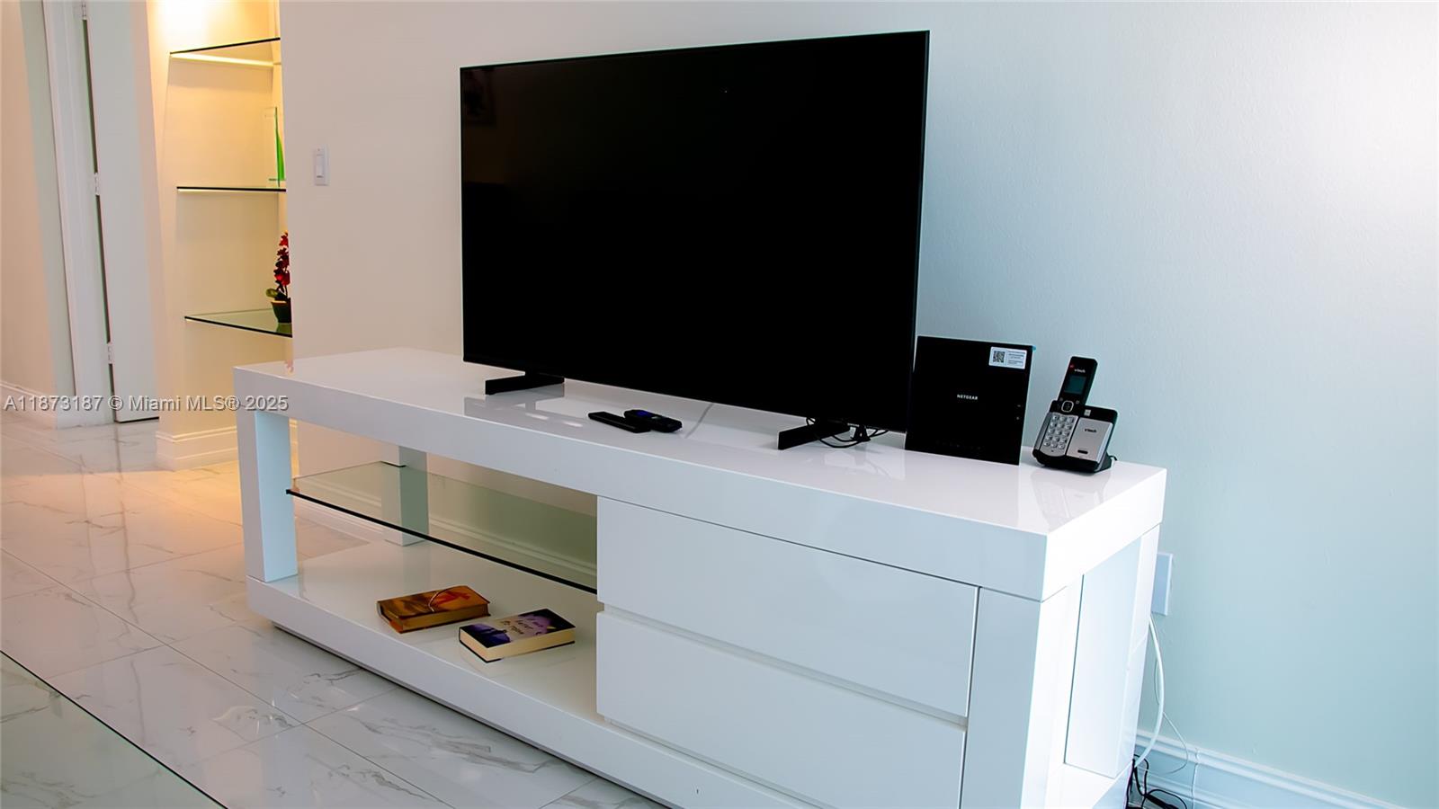18100 North Bay Road, Unit 906 Sunny Isles Beach, FL 33160 - Photo 16 of 21 a utility room with dryer and washer