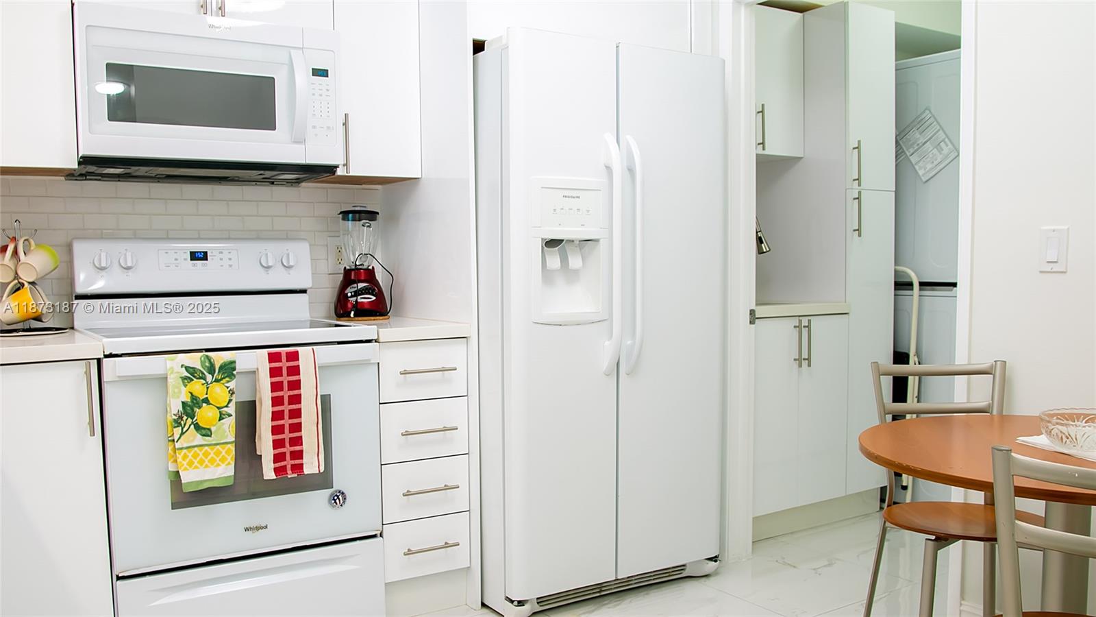 18100 North Bay Road, Unit 906 Sunny Isles Beach, FL 33160 - Photo 8 of 21 a bathroom with a sink and a mirror