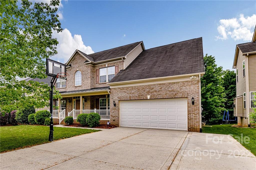 7179 Meyer Road Fort Mill, SC 29715 - Photo 2 of 47 front view of a house with a yard