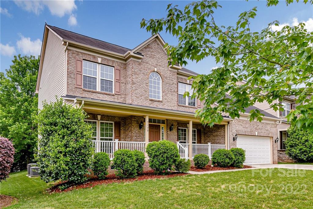7179 Meyer Road Fort Mill, SC 29715 - Photo 3 of 47 front view of a house with a yard