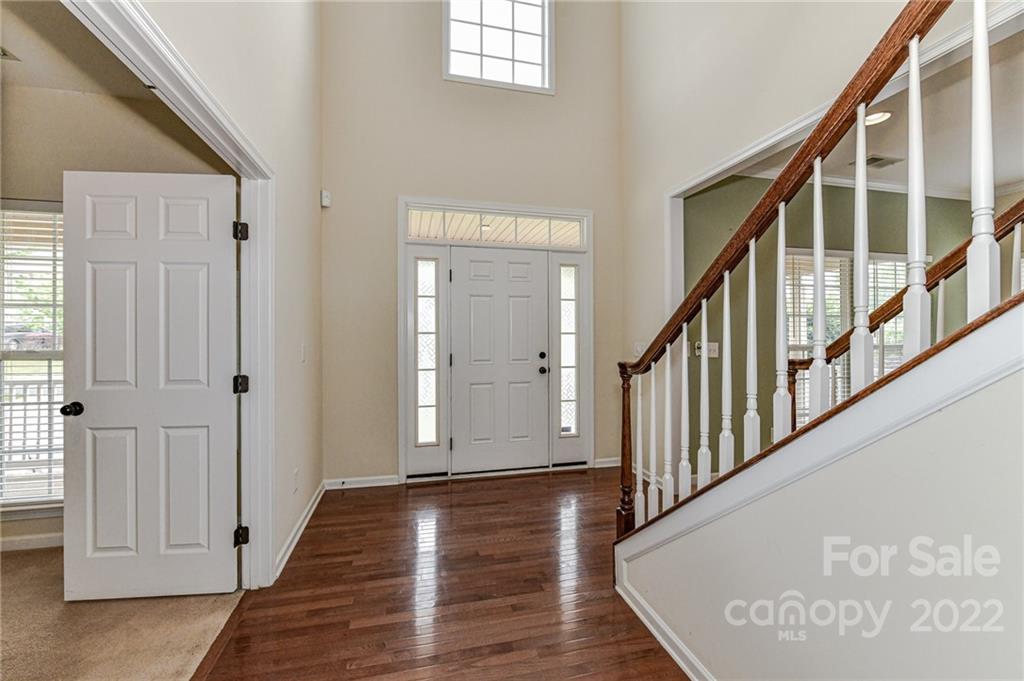 7179 Meyer Road Fort Mill, SC 29715 - Photo 7 of 47 a view of an entryway with wooden floor