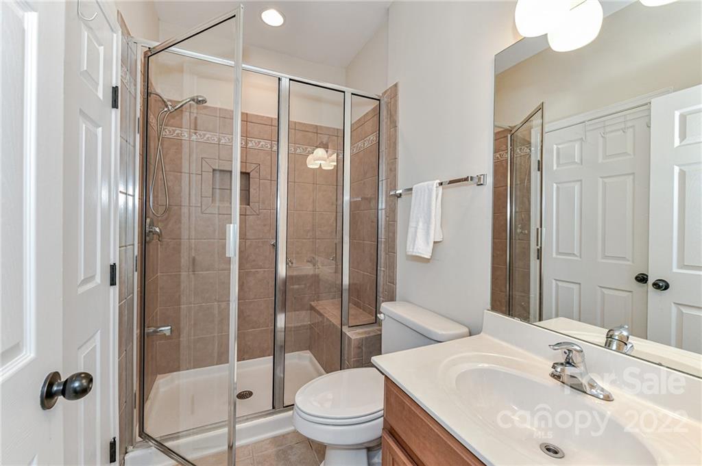 7179 Meyer Road Fort Mill, SC 29715 - Photo 10 of 47 a bathroom with a sink toilet and shower