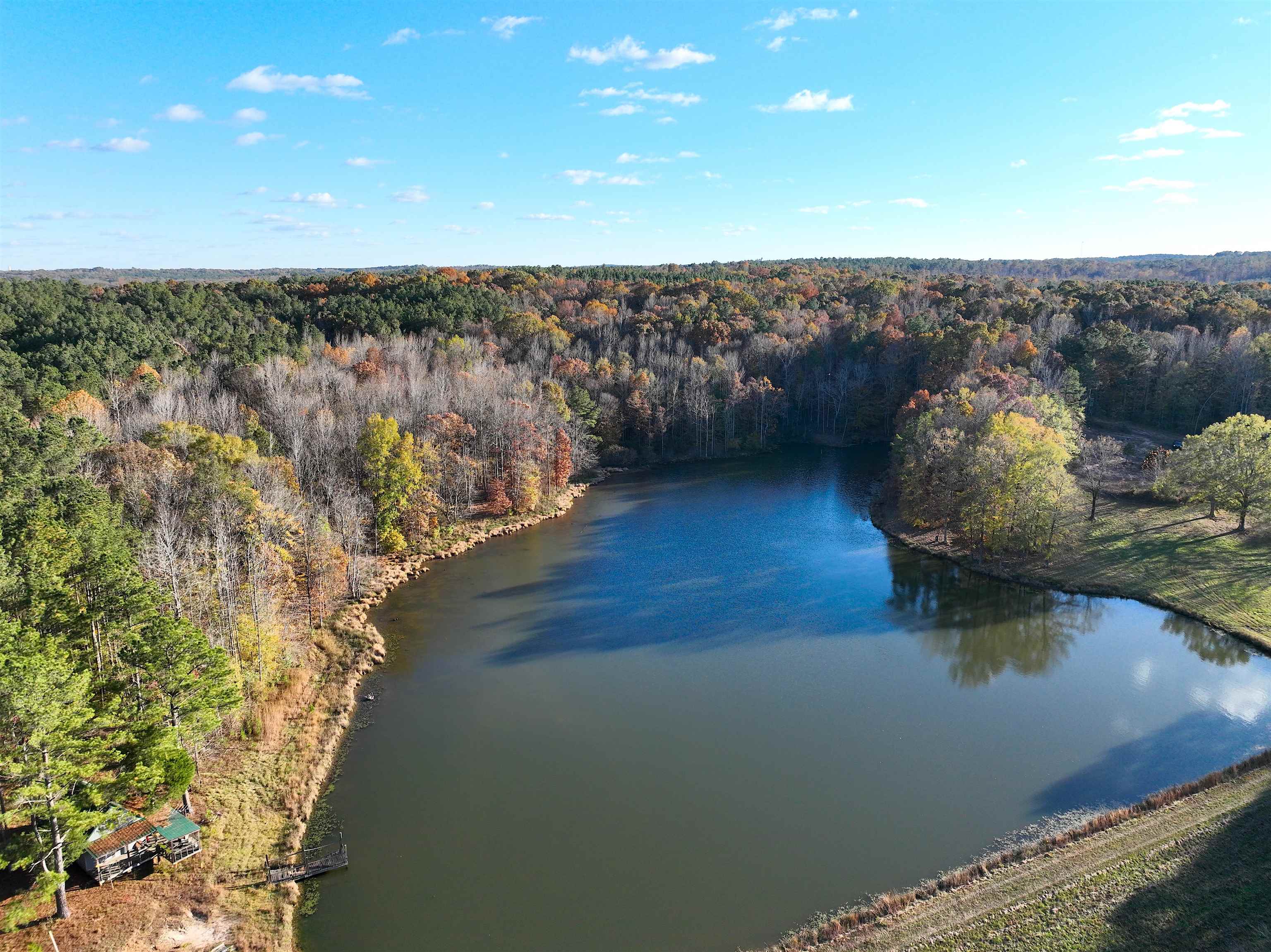 2255 Cr 105 Road Walnut, MS 38683 - Photo 3 of 31 a view of a lake with outdoor space