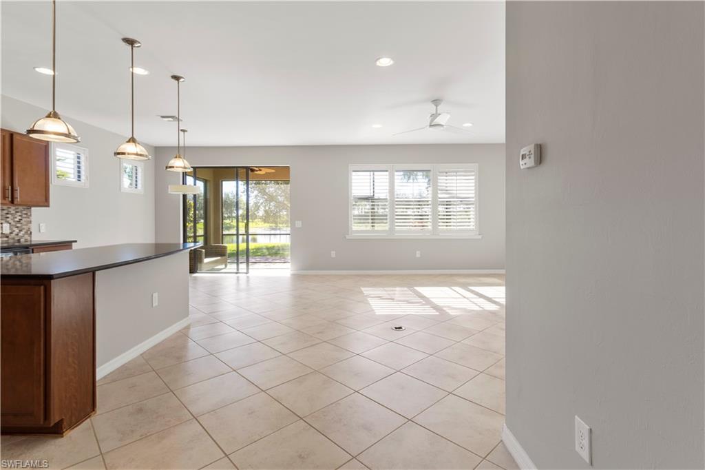 6068 Triumph Lane Ave Maria, FL 34142 - Photo 11 of 27 a view of an empty room with a window