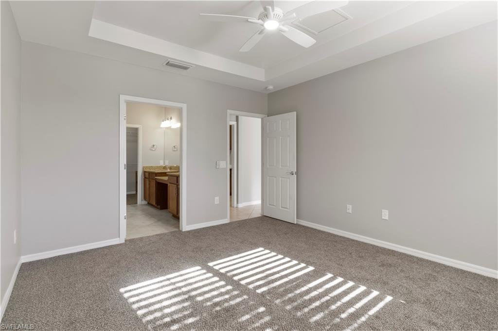 6068 Triumph Lane Ave Maria, FL 34142 - Photo 17 of 27 a view of a livingroom with a workspace
