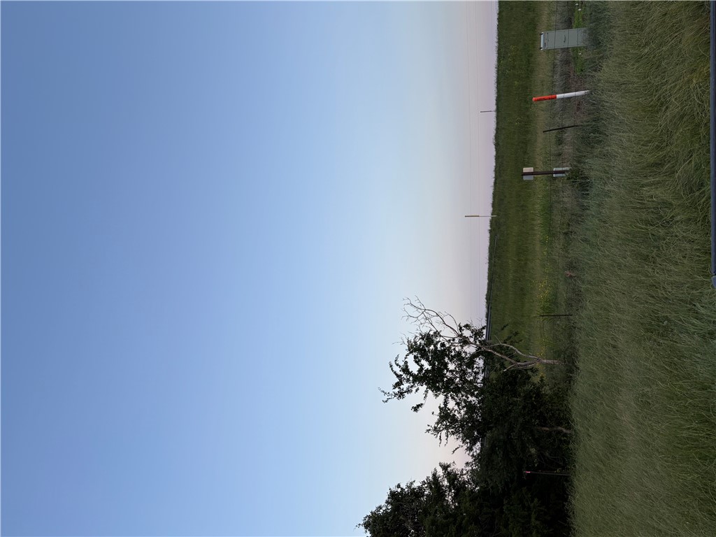 2293 East Ne Northeast Bremond, TX 76629 - Photo 8 of 14 a view of a field with grass and trees