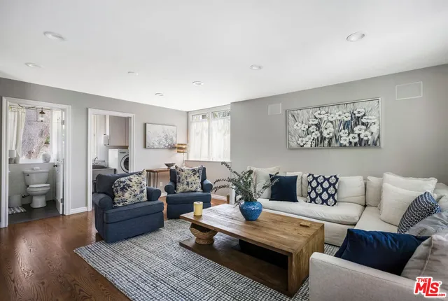 a living room with furniture and a couch