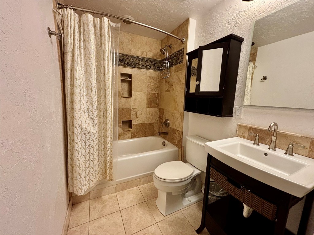 1310 Baldy Road, Unit D Breckenridge, CO 80424 - Photo 22 of 28 a bathroom with a sink toilet and shower
