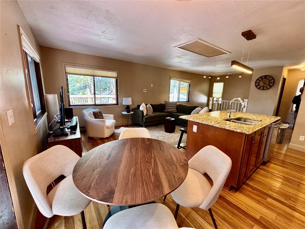 1310 Baldy Road, Unit D Breckenridge, CO 80424 - Photo 9 of 28 a living room with furniture kitchen view and a large window