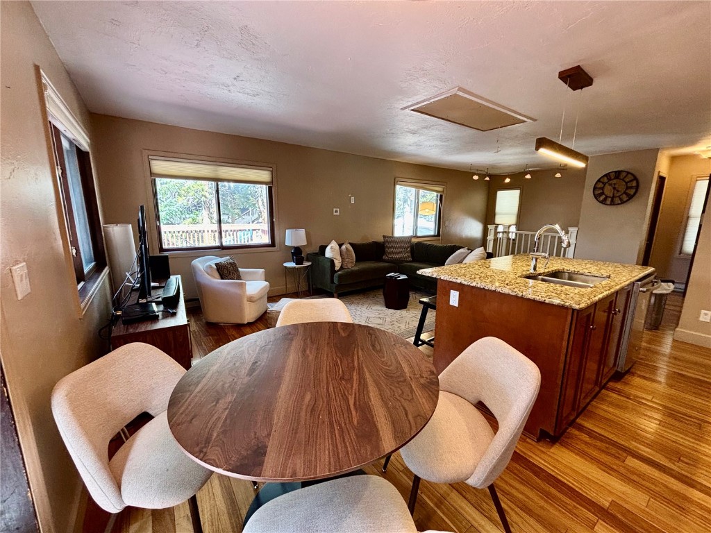 1310 Baldy Road, Unit D Breckenridge, CO 80424 - Photo 10 of 28 a living room with furniture kitchen view and a large window
