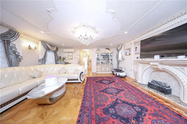 a living room with furniture and a table