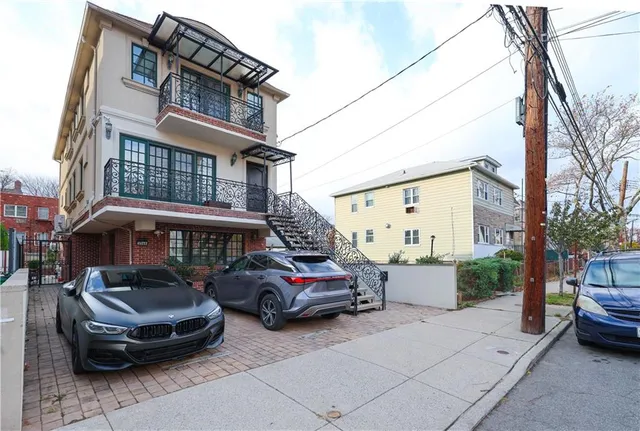 a car parked in front of a house