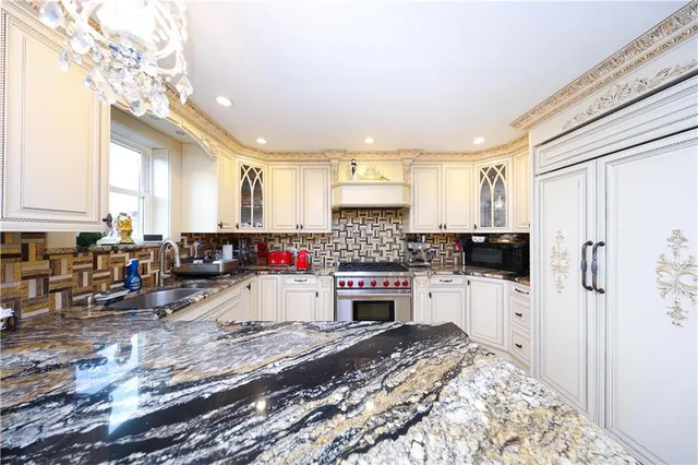 a work room with furniture and a book shelf