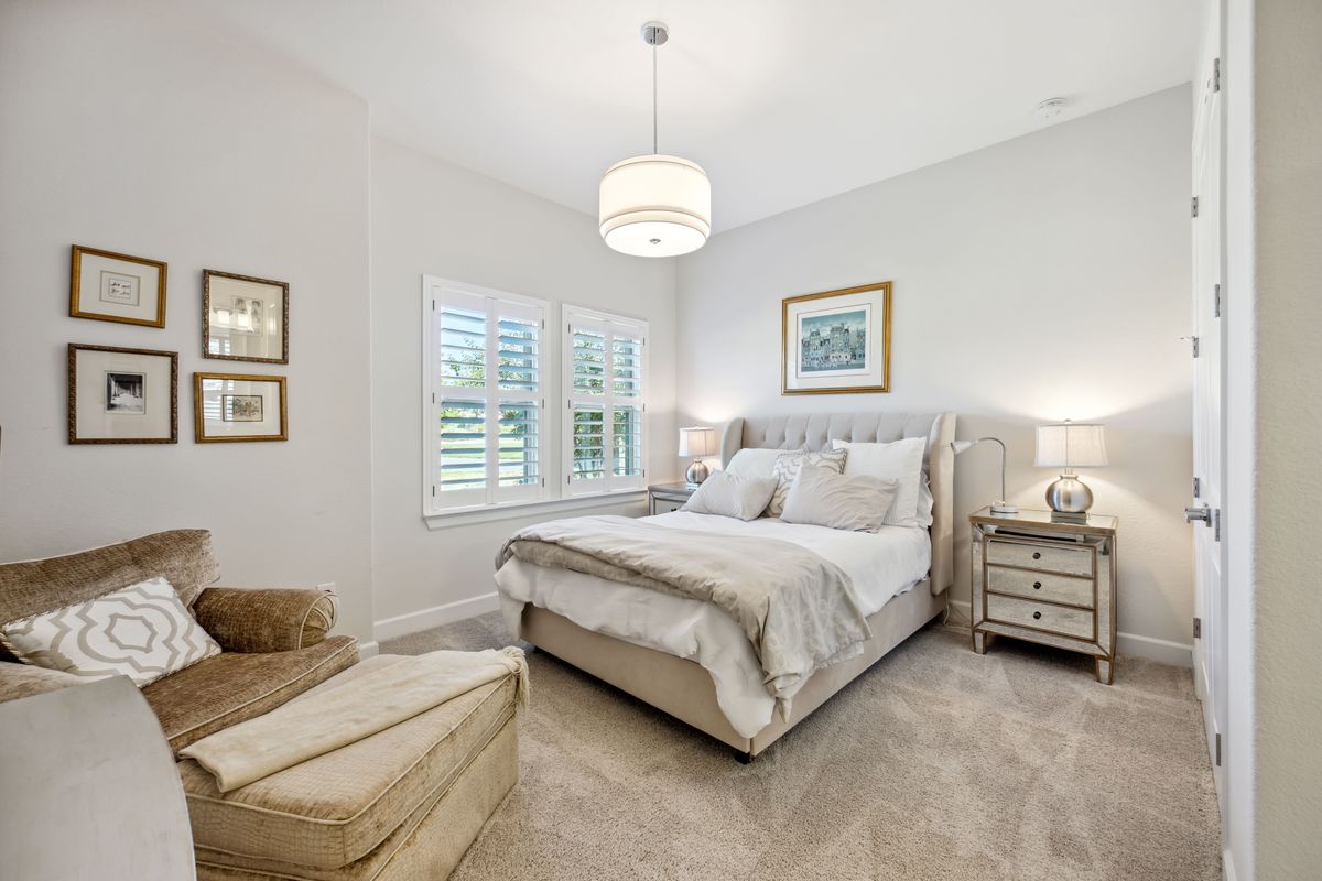9600 Chamois Way Austin, TX 78736 - Photo 9 of 14 Bedroom with carpet and baseboards