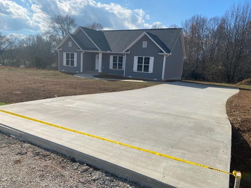 162 Pisgah Ridge Road Pulaski, TN 38478 - Photo 5 of 5 a front view of a house with a yard