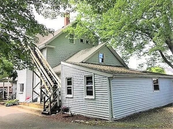 a view of a house with a garage