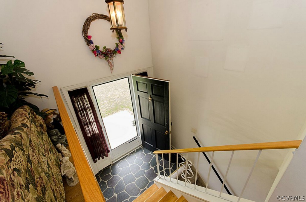15101 Rowlett Road Chesterfield, VA 23838 - Photo 4 of 16 a view of walk in closet with clothes and shoes