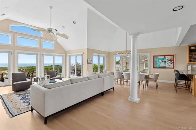 a kitchen with a sink window and cabinets