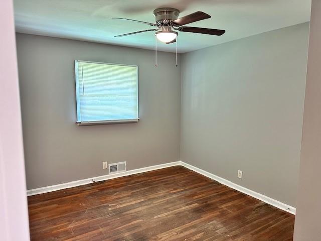 2377 Clifton Springs Manor Decatur, GA 30034 - Photo 10 of 16 an empty room with wooden floor ceiling fan and windows